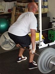 Nate Dogg performing the Hack Squat - image via T-Nation