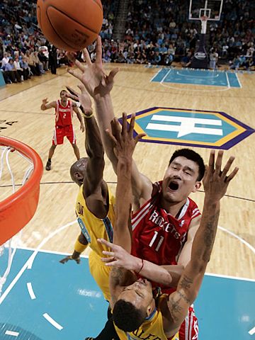 China's Yao Ming playing for the Houston Rockets. Photo &copy; Flock.