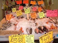 Fishmonger in Philadelphia's 9th Street Italian Market. Photo &copy; Joy Gant.