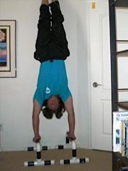 Handstand on Paralettes