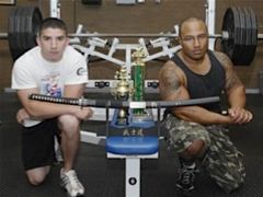 Airman 1st Class Brandon Reyes (left), 27th Medical Group, and Tech. Sgt. Kevin Parker, 27th Fighter Wing information manager