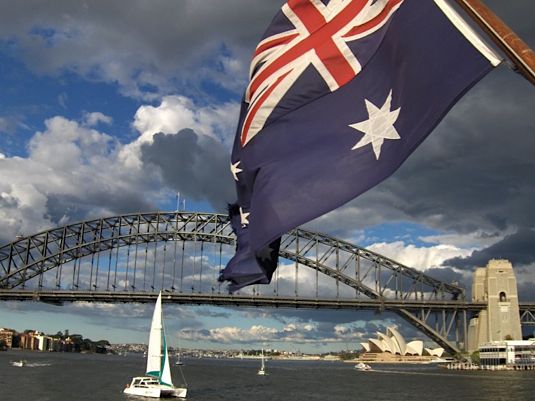Australian flag and Sydney Harbour Bridge. Photo by Lindsay.