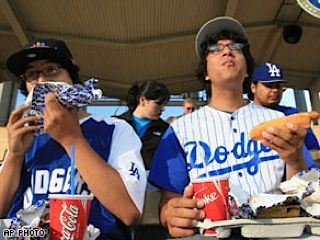 LA Dogers enjoying the 'All you can eat' seats. Photo via AP.